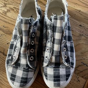 Corey’s size 8 cute canvas shoes.